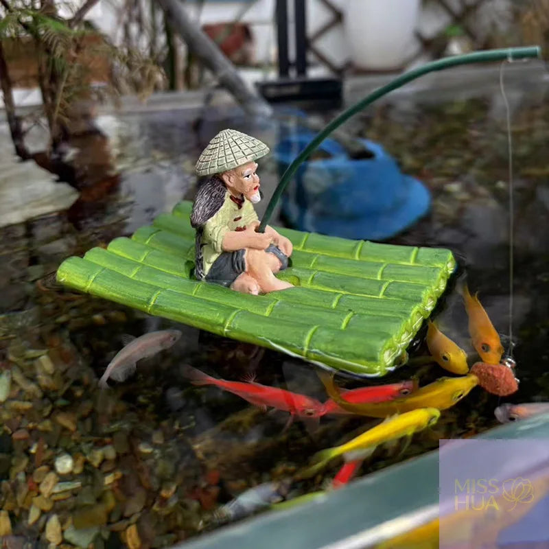 Schwimmende Aquarium-Deko – Alter Fischer auf Floß, Kunstharz, Grün, Fischbecken & Schreibtisch