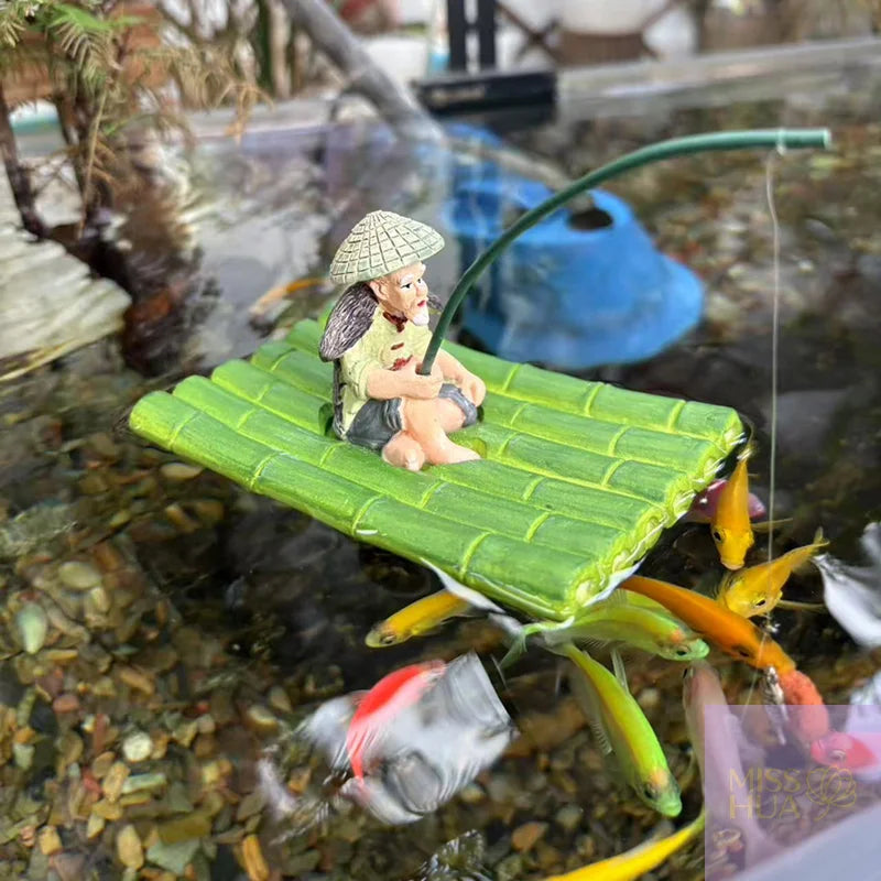 Schwimmende Aquarium-Deko – Alter Fischer auf Floß, Kunstharz, Grün, Fischbecken & Schreibtisch