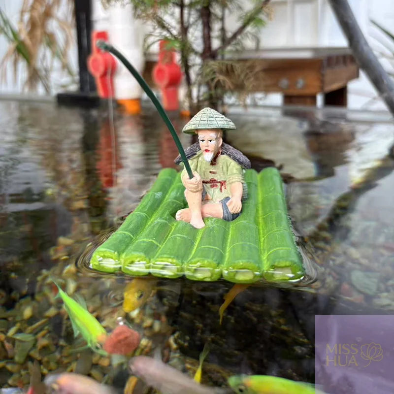 Schwimmende Aquarium-Deko – Alter Fischer auf Floß, Kunstharz, Grün, Fischbecken & Schreibtisch