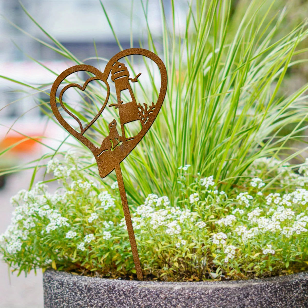 Gartenstecker Leuchtturm und Robbe – Maritimer Gartendeko-Stecker in Rostoptik