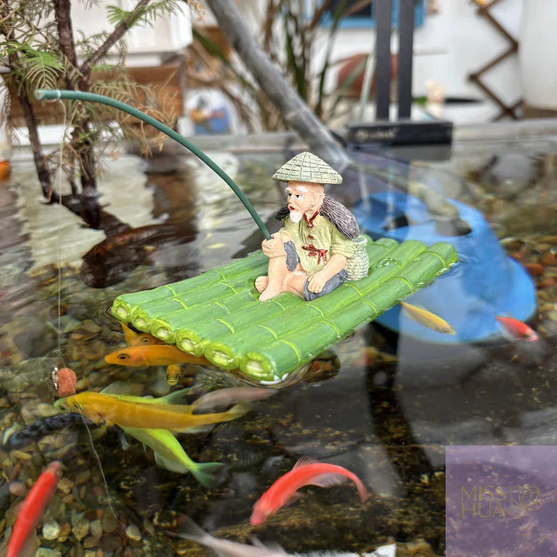 Schwimmende Aquarium-Deko – Alter Fischer auf Floß, Kunstharz, Grün, Fischbecken & Schreibtisch